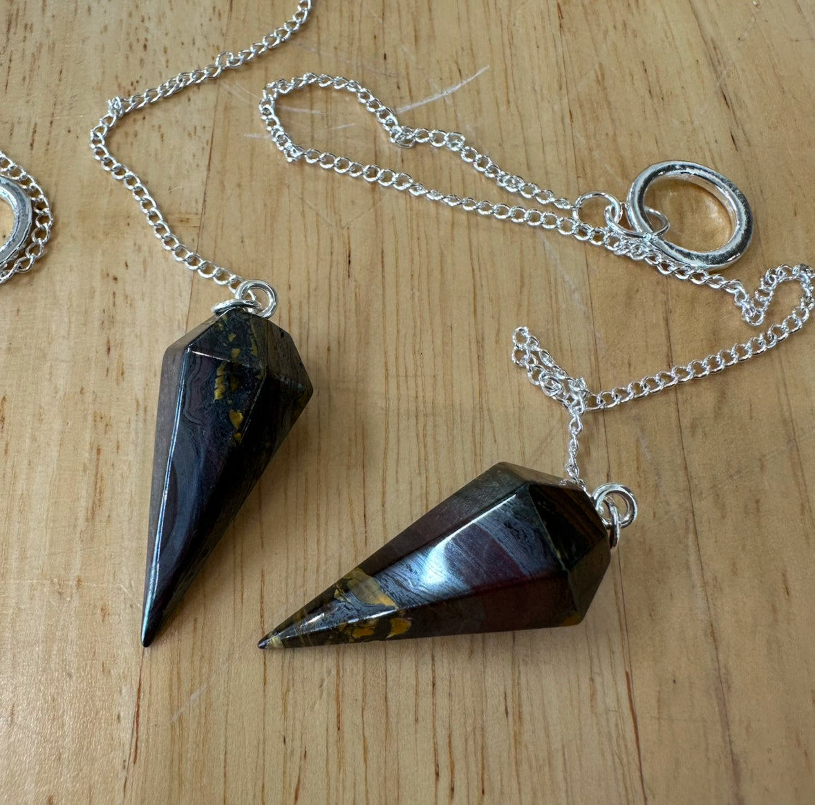 Crystal carvings, shapes, crystal trees and pendulums