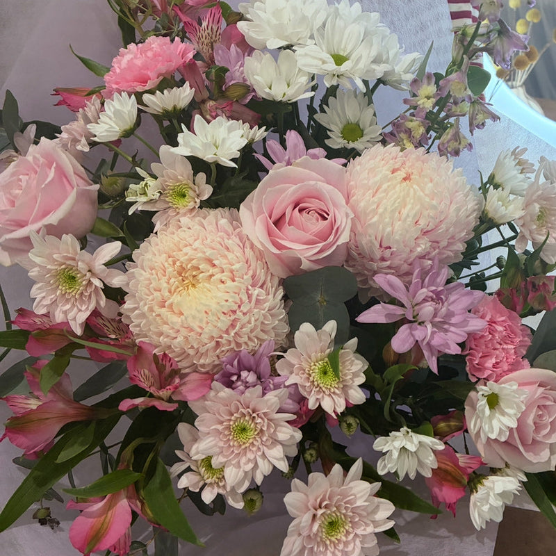 Fresh seasonal flowers including roses, handcrafted by local florist. Popular flowers Launceston