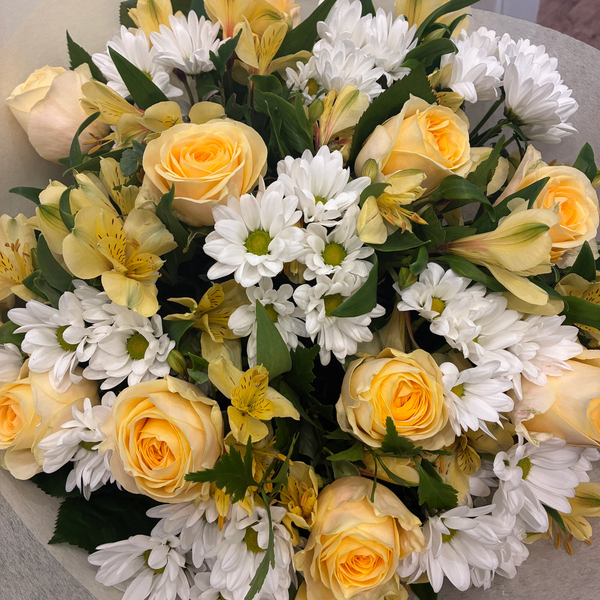 Deluxe rose bouquet with chrysanthemums and alstro ready for local flower delivery.