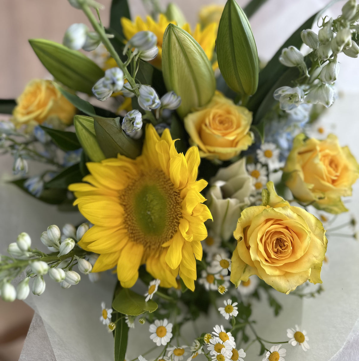 Yellow roses, sunflowers, pale blue delphiniums and white daisy flower bouquet. Prospect, Prospect Vale and Blackstone Heights flower deliveries