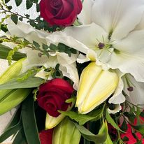 A bouquet of red roses and white lilies at My Florist Launceston