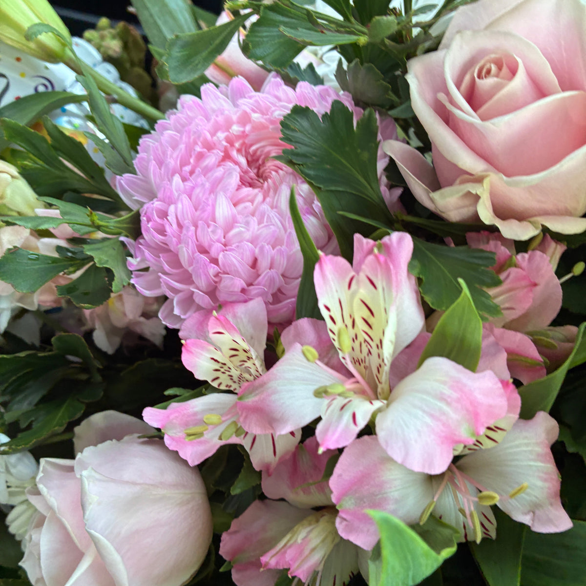 Close-up of a pastel flower bouquet featuring soft pink roses, ready for Launceston flower delivery