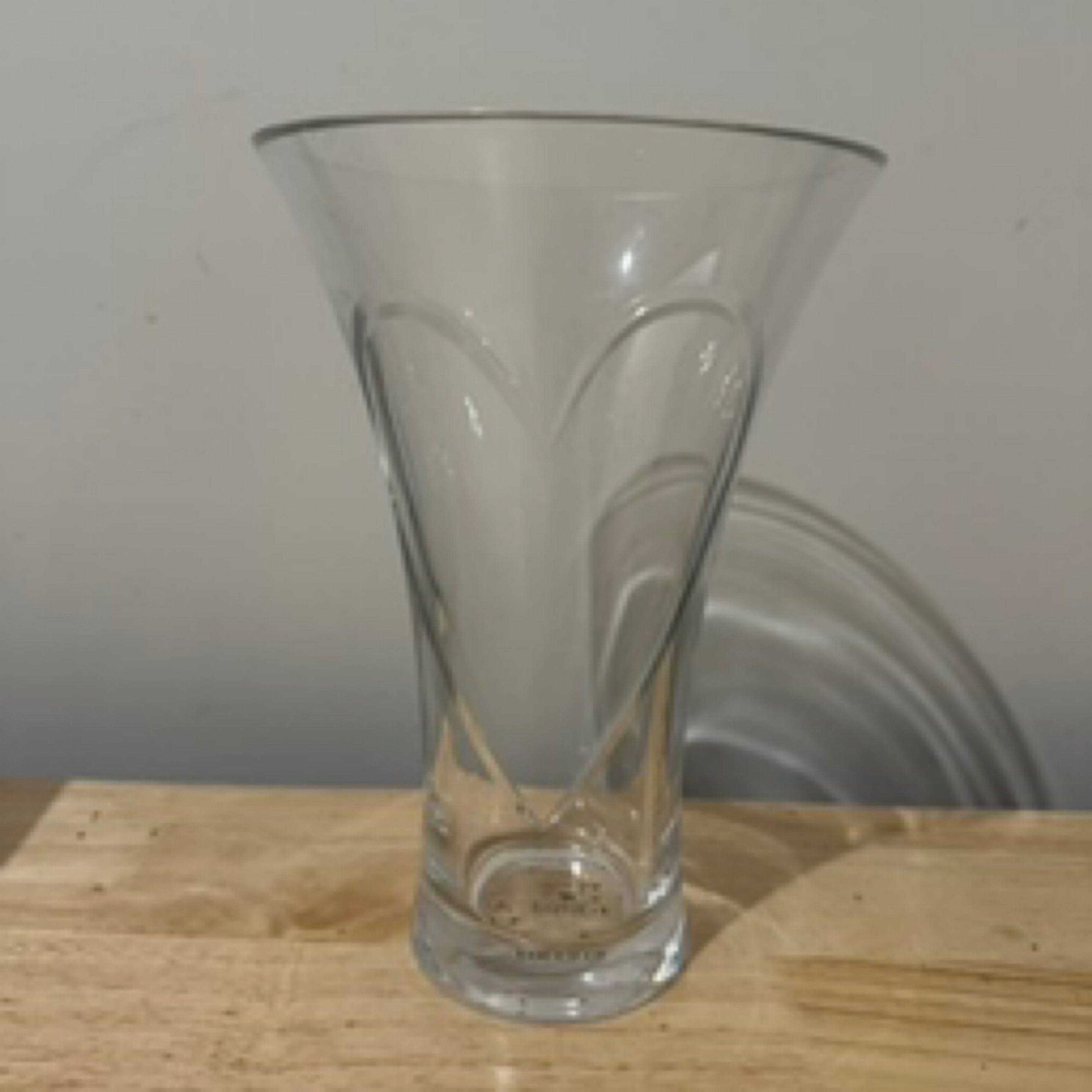 the glass vase showing the heart image