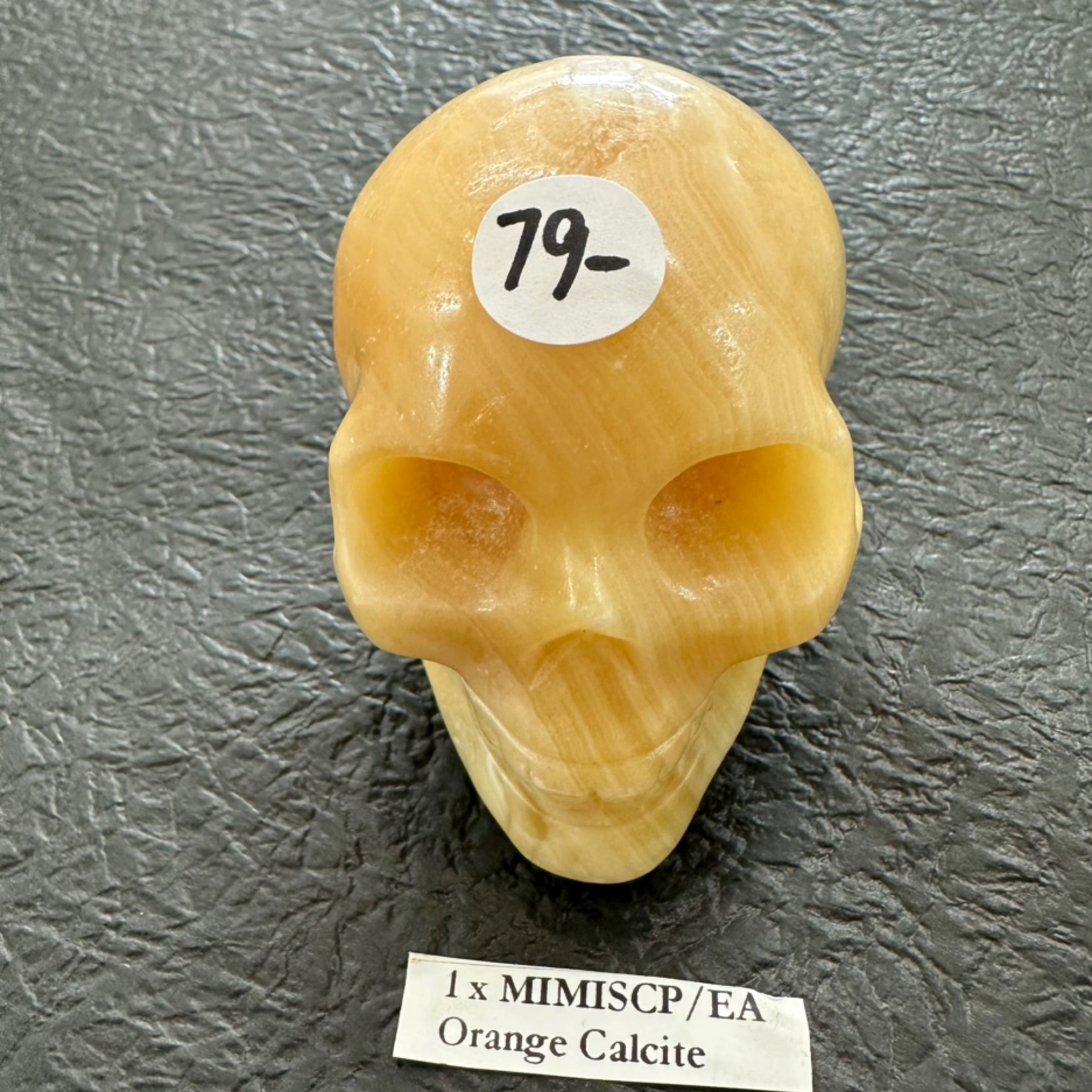 नारंगी कैल्साइट खोपड़ी