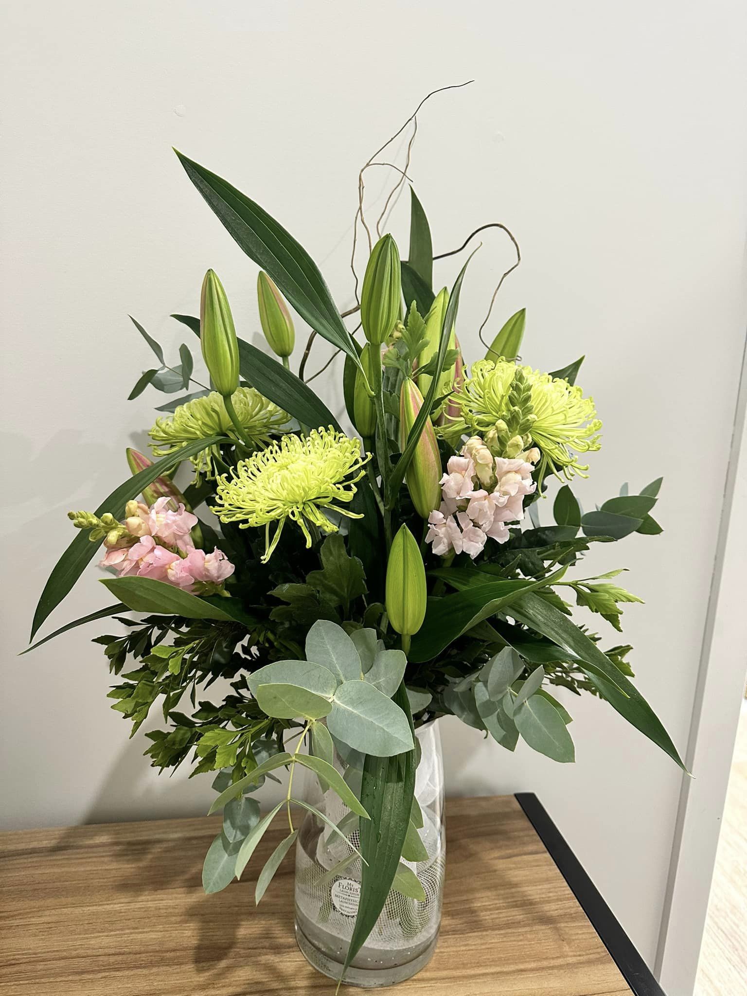 Seasonal vase arrangement with lilies, snapdragons and disbud chrysanthemums from My Florist Launceston